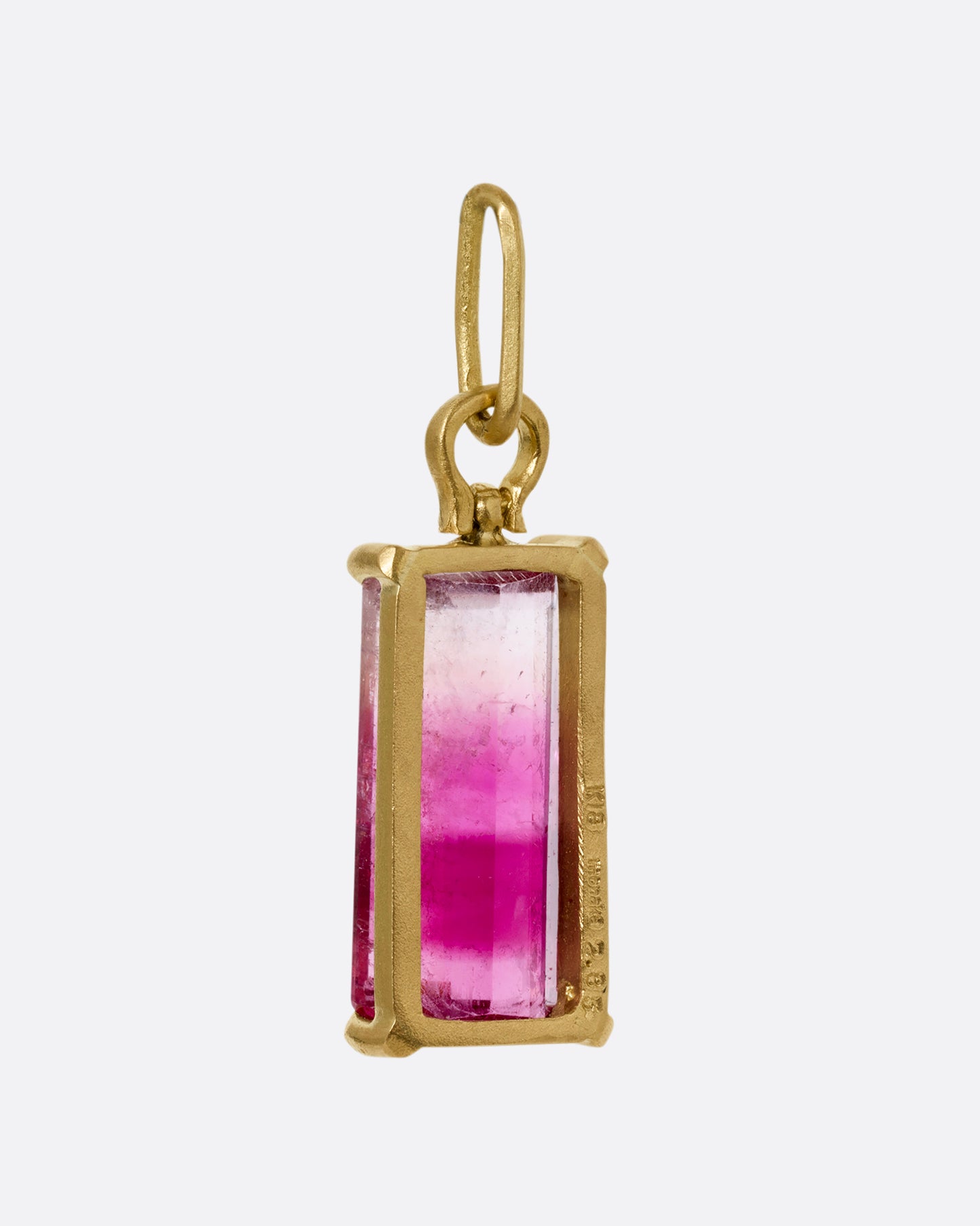 prong set pink tourmaline pendant shown from the back
