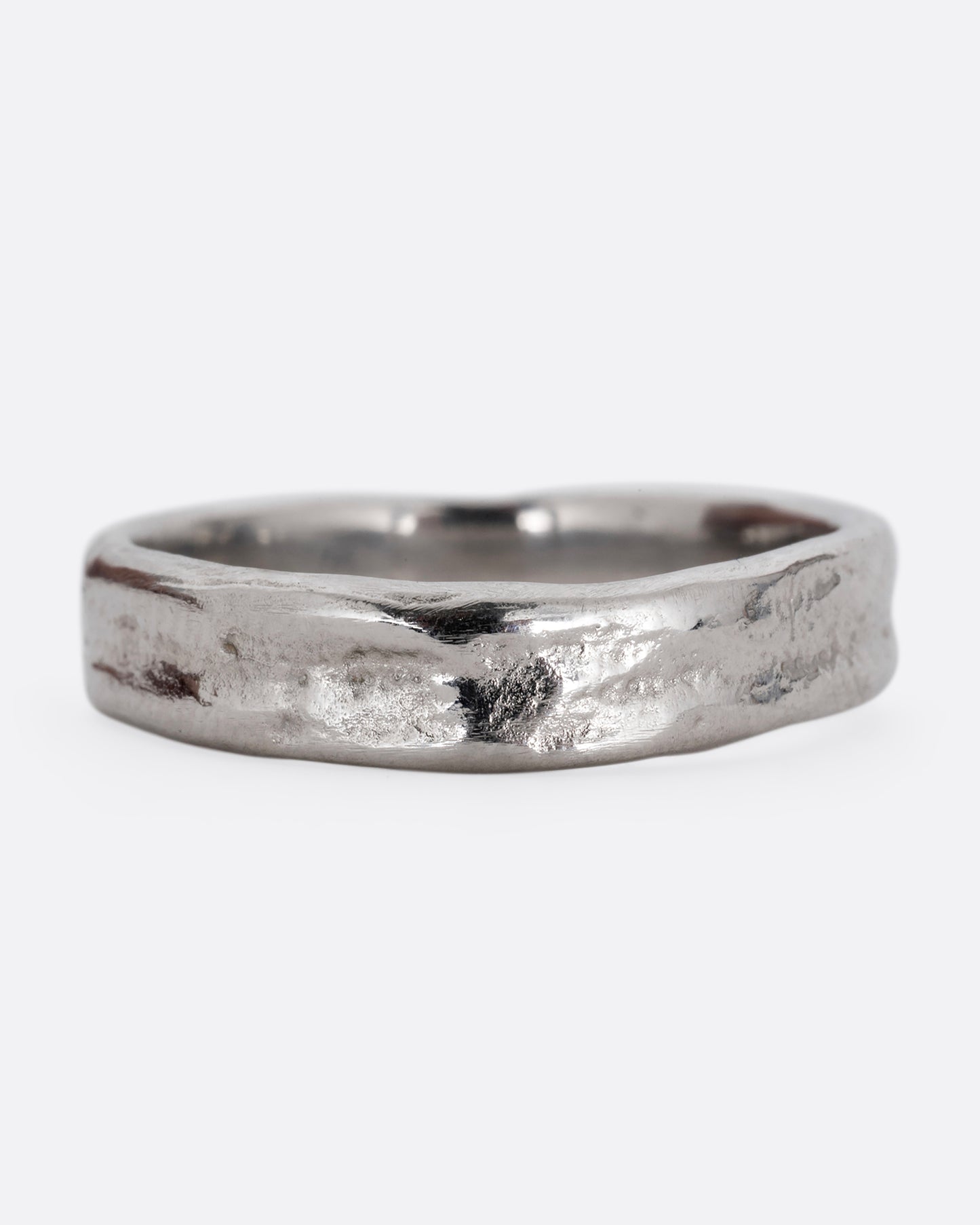 A platinum textured band with an irregular band, shown straight on.