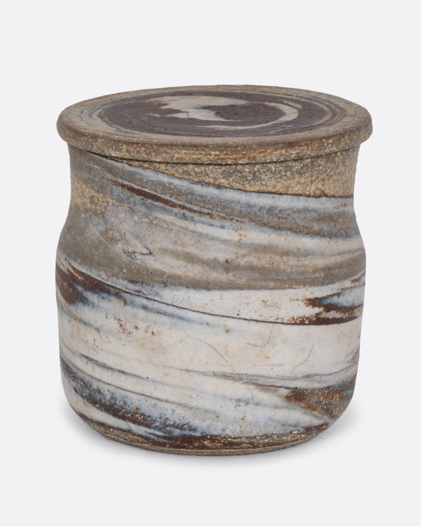 A lidded jar with a gray swirled matte exterior and glazed interior. Shown from the front.