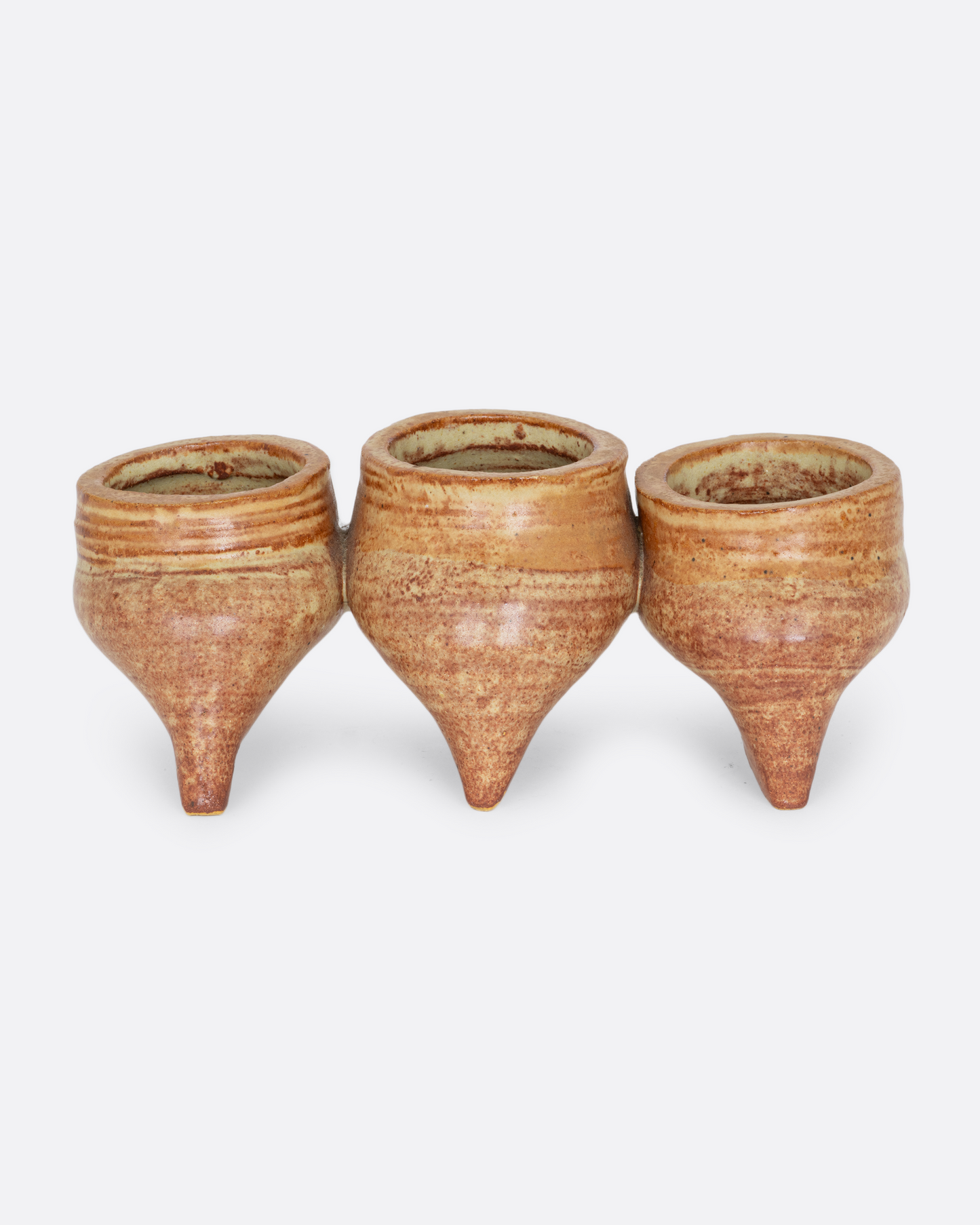 Three connected planters with pinched bottoms, drainage holes, and feet. Shown from the side.