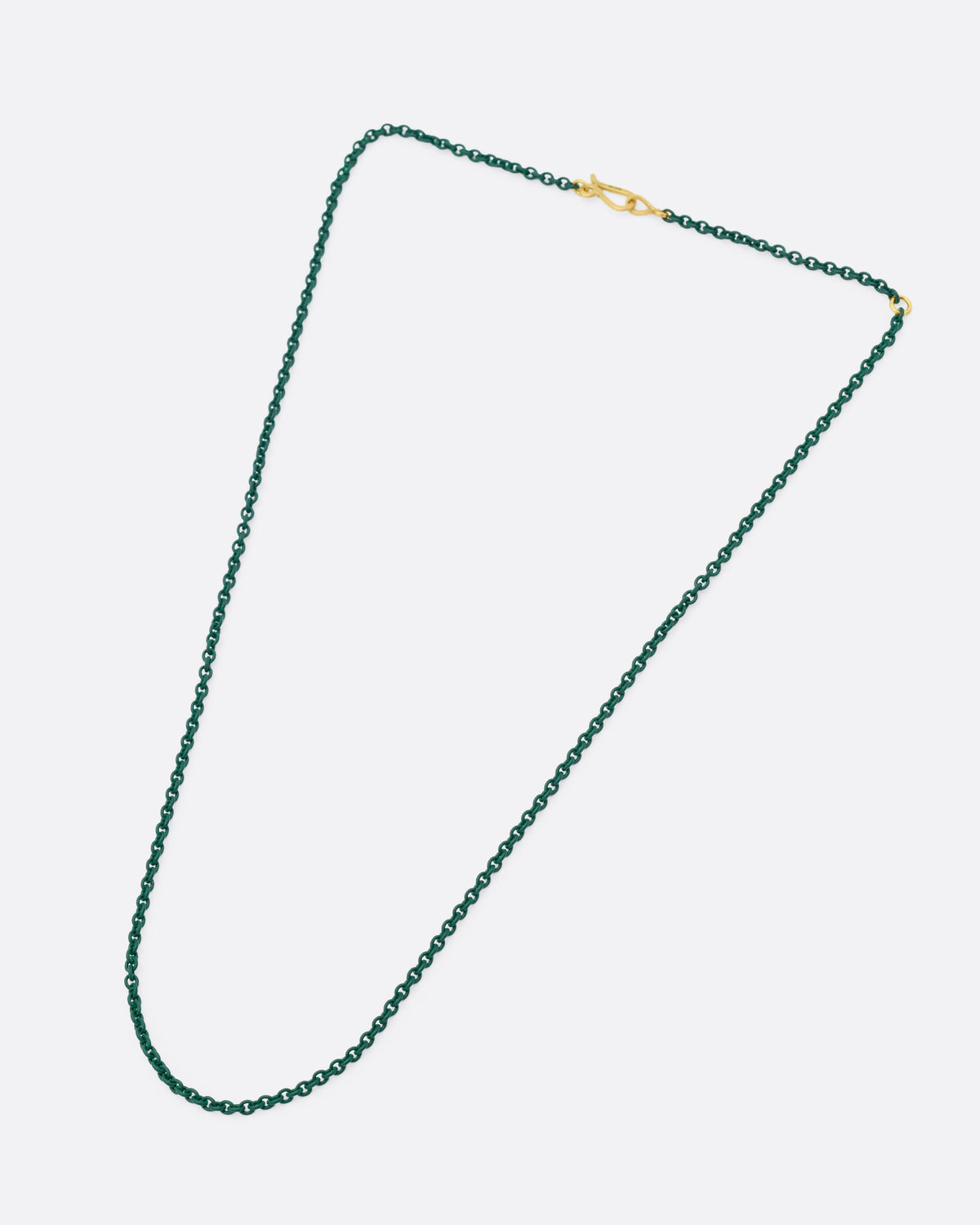 A moss green acrylic coated silver chain necklace, with a yellow gold clasp, shown from the front.