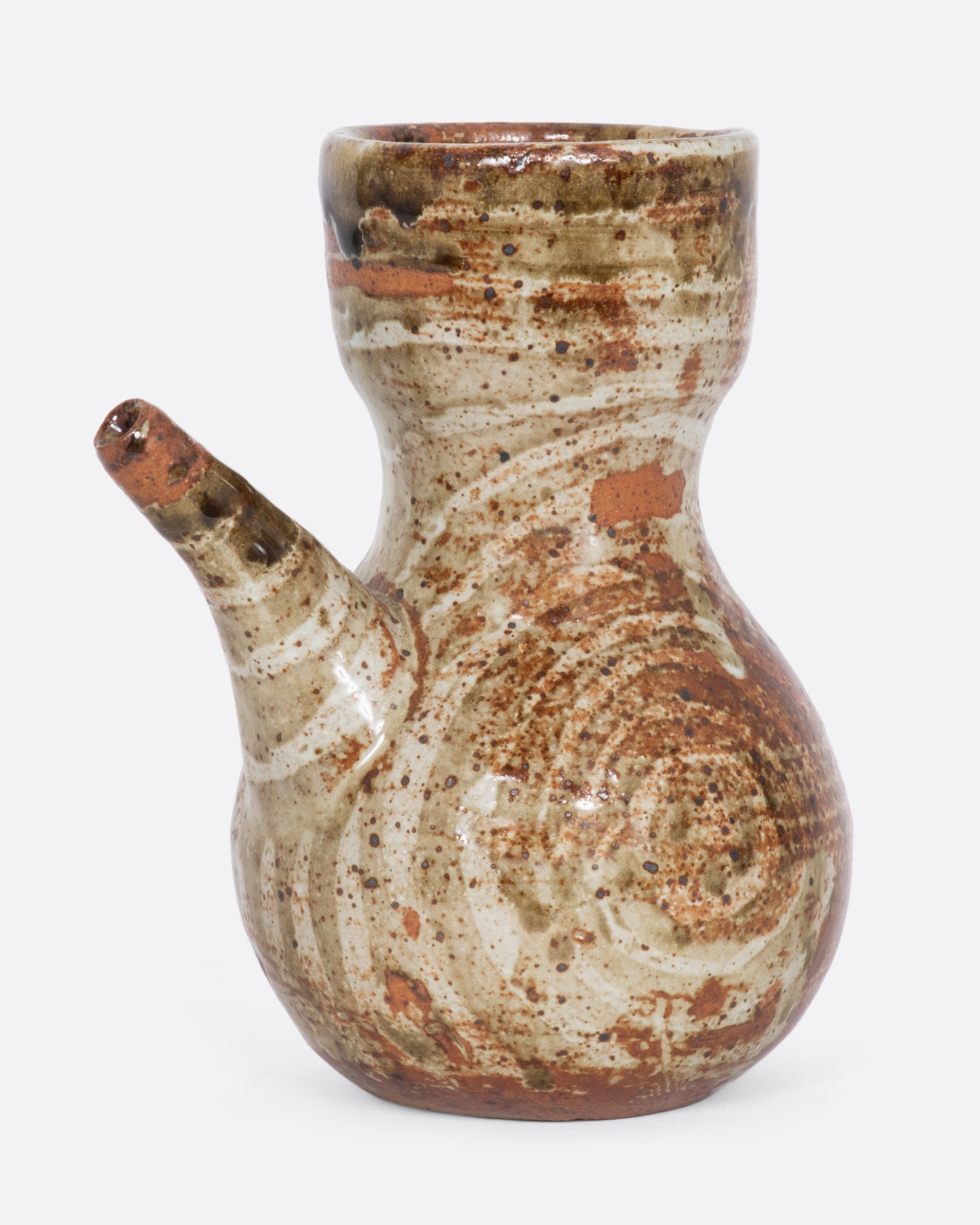 Ceramic bullseye patterned spouted sake jar.