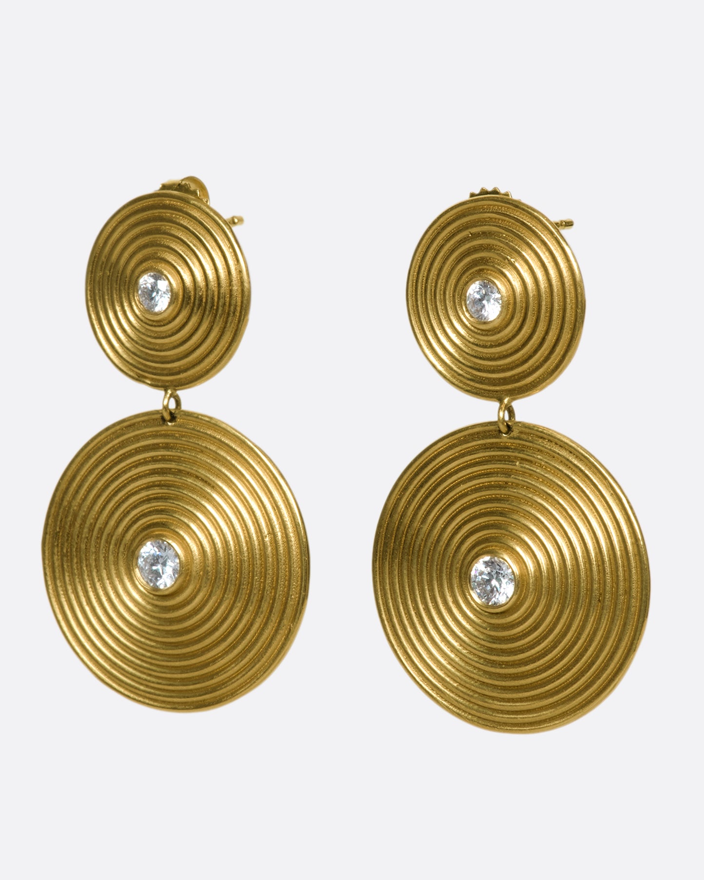 14k gold disc drops, each puntcuated with two white diamonds. The concentric circles are elegant symbols of growth and change.