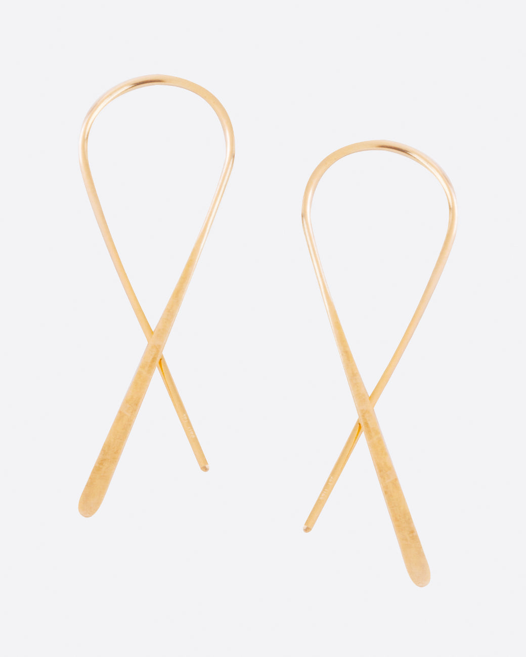 Fairmined, hammered gold, crossed hook earrings.