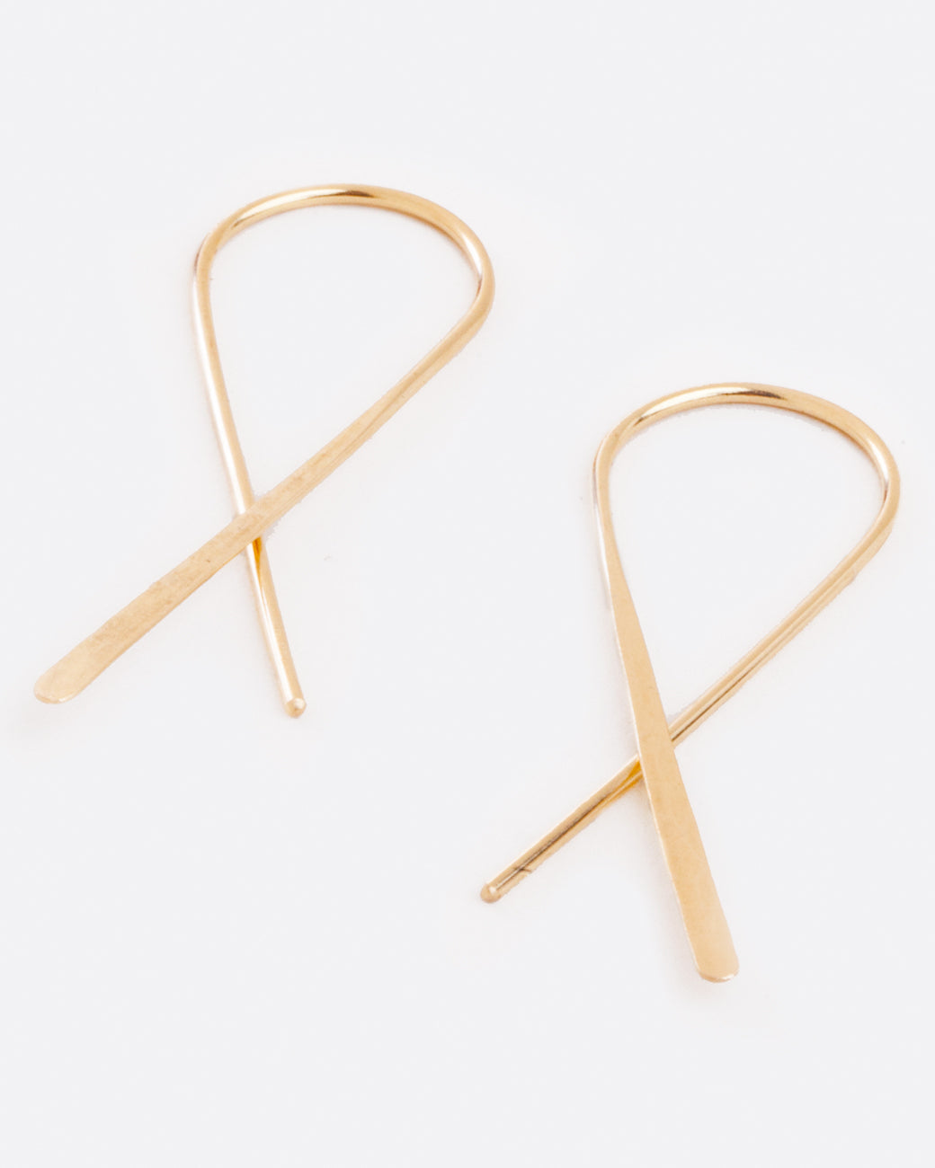 Fairmined, hammered gold, crossed hook earrings.