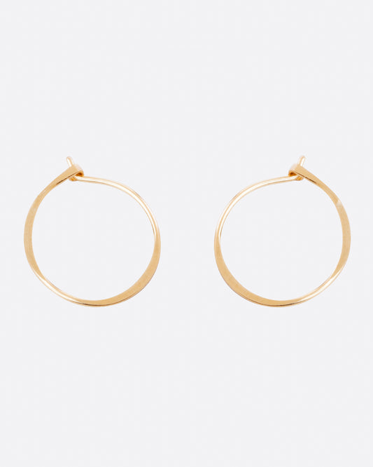Fairmined gold, hand-hammered round hoop earrings that close upon themselves.