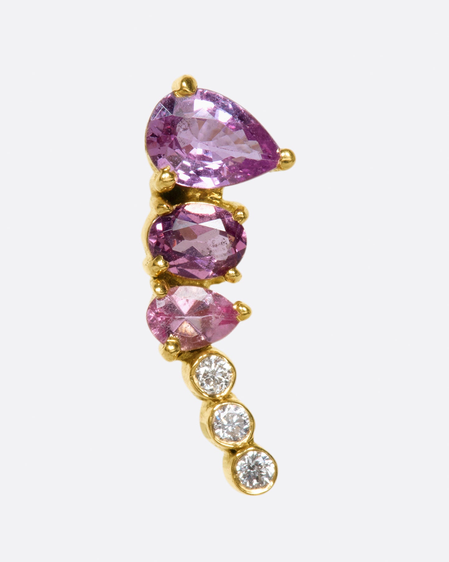 An exceptional pink and purple sapphire and tourmaline earring that elegantly tapers to a diamond tail. 