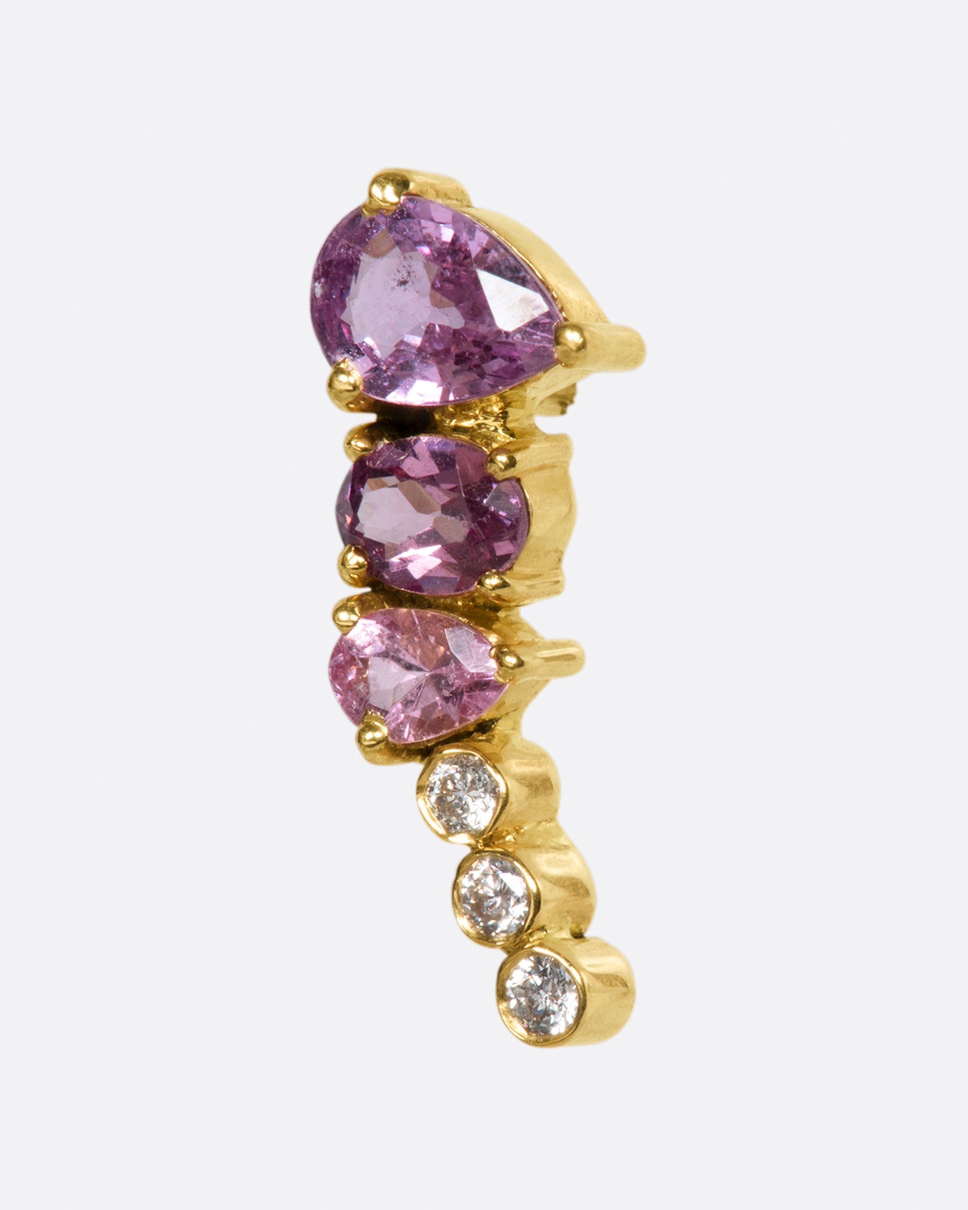 An exceptional pink and purple sapphire and tourmaline earring that elegantly tapers to a diamond tail. 