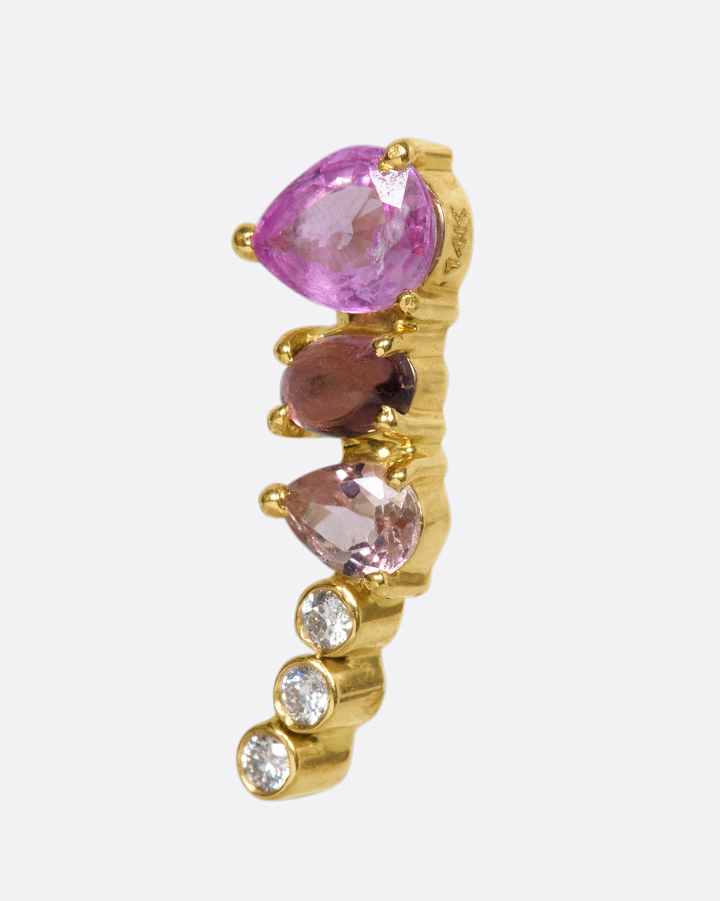 An exceptional pink and purple sapphire and tourmaline earring that elegantly tapers to a diamond tail. 