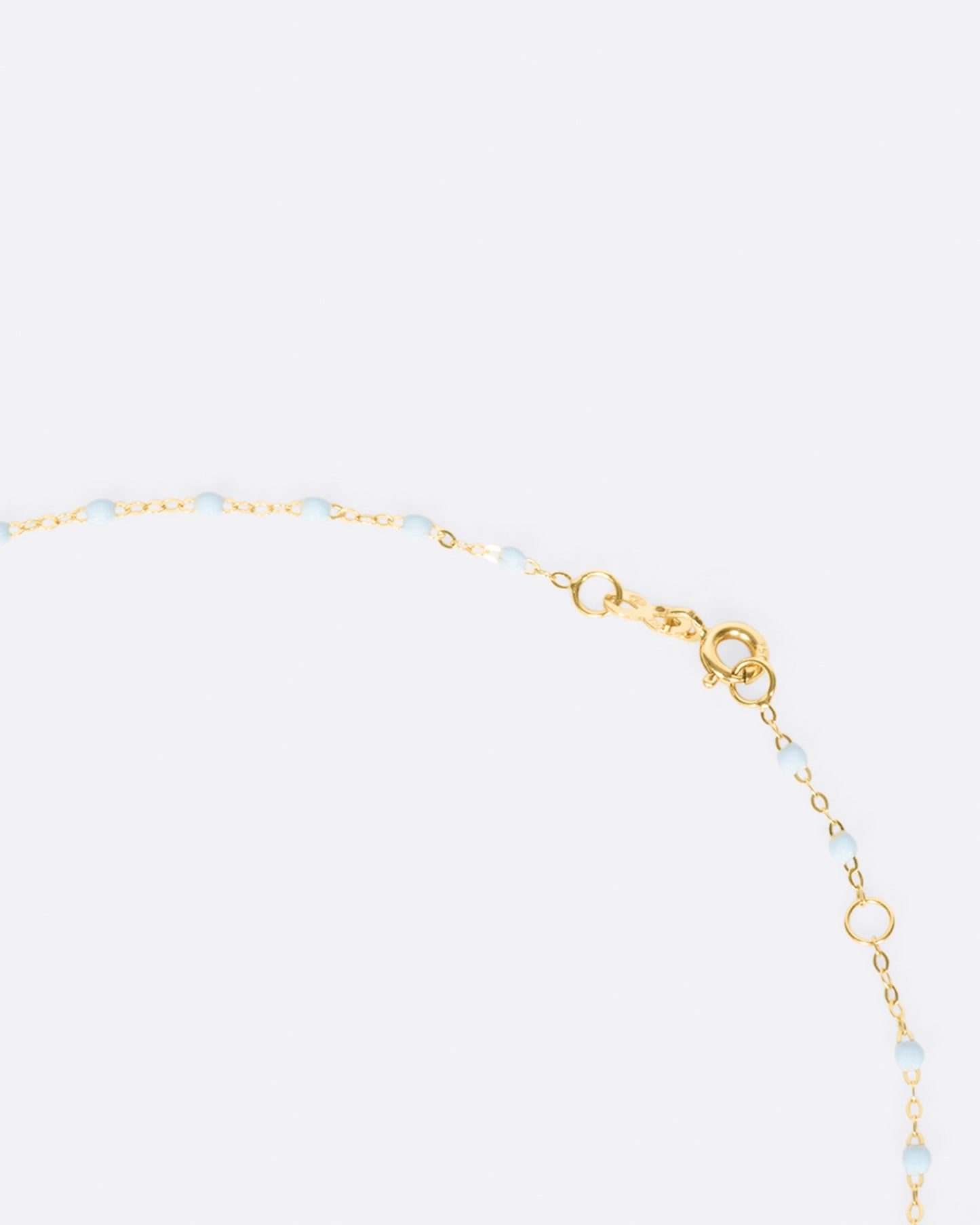 Thin 18k yellow gold chain necklace with resin beads. Each necklace is hand dipped in melted resin to create the beaded effect. 