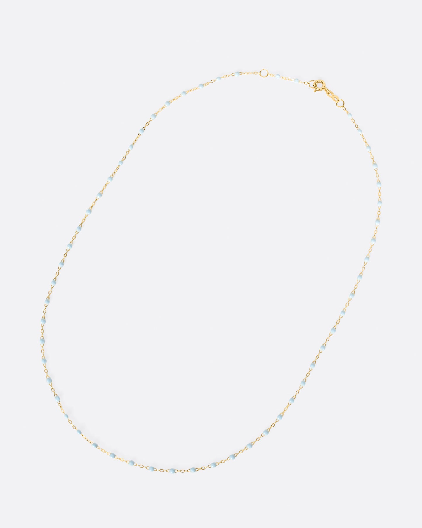 Thin 18k yellow gold chain necklace with resin beads. Each necklace is hand dipped in melted resin to create the beaded effect. 