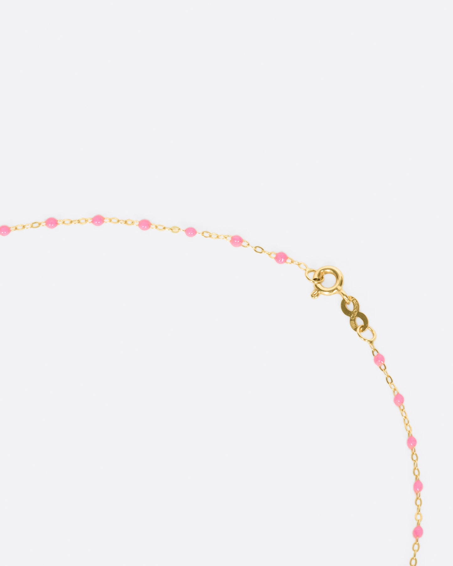 Thin 18k yellow gold chain necklace with resin beads. Each necklace is hand dipped in melted resin to create the beaded effect.