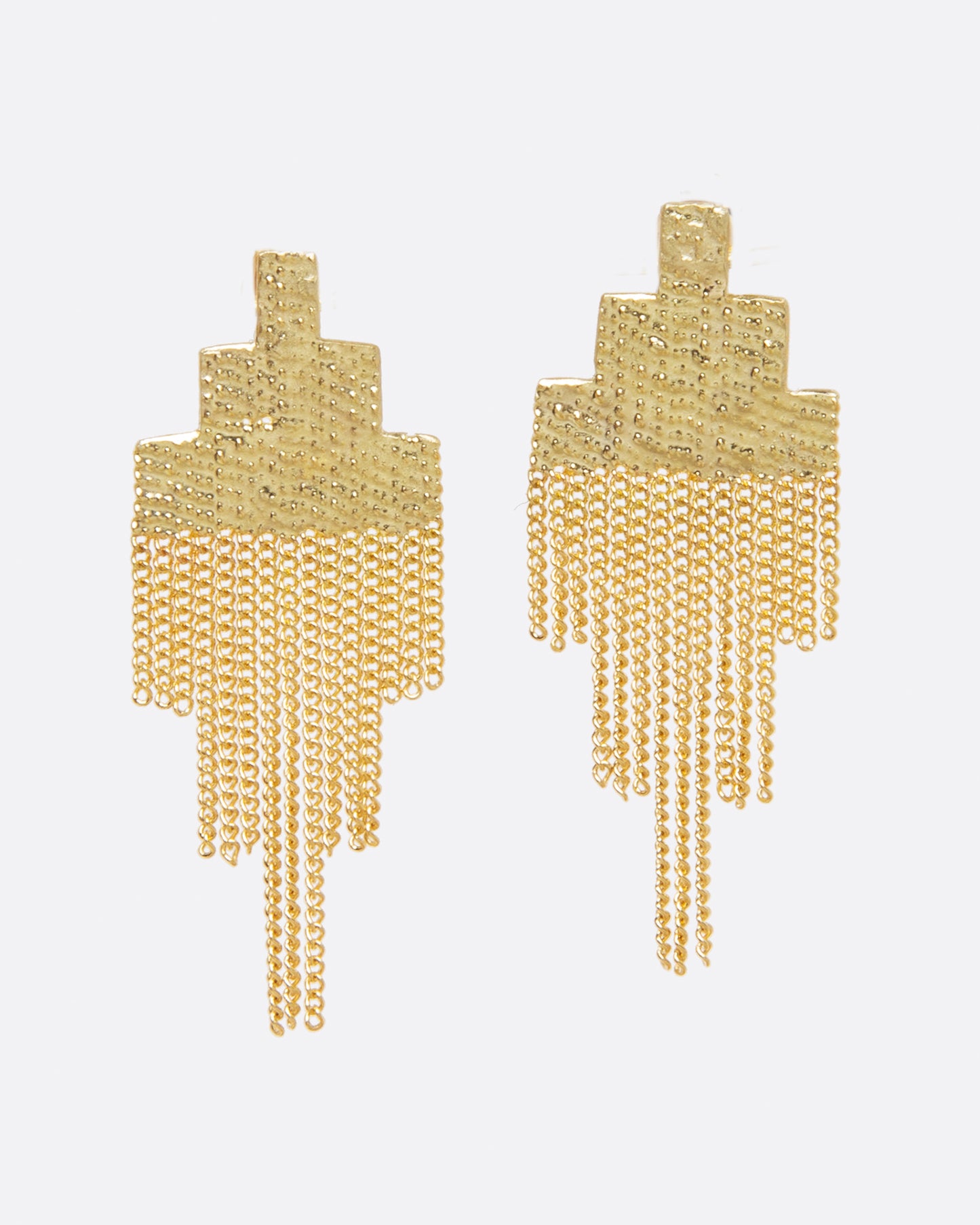 A pair of earrings made of chains in the shape of pixels. The top half has been soldered together to make it solid, but the bottom half is left to move with the wearer.