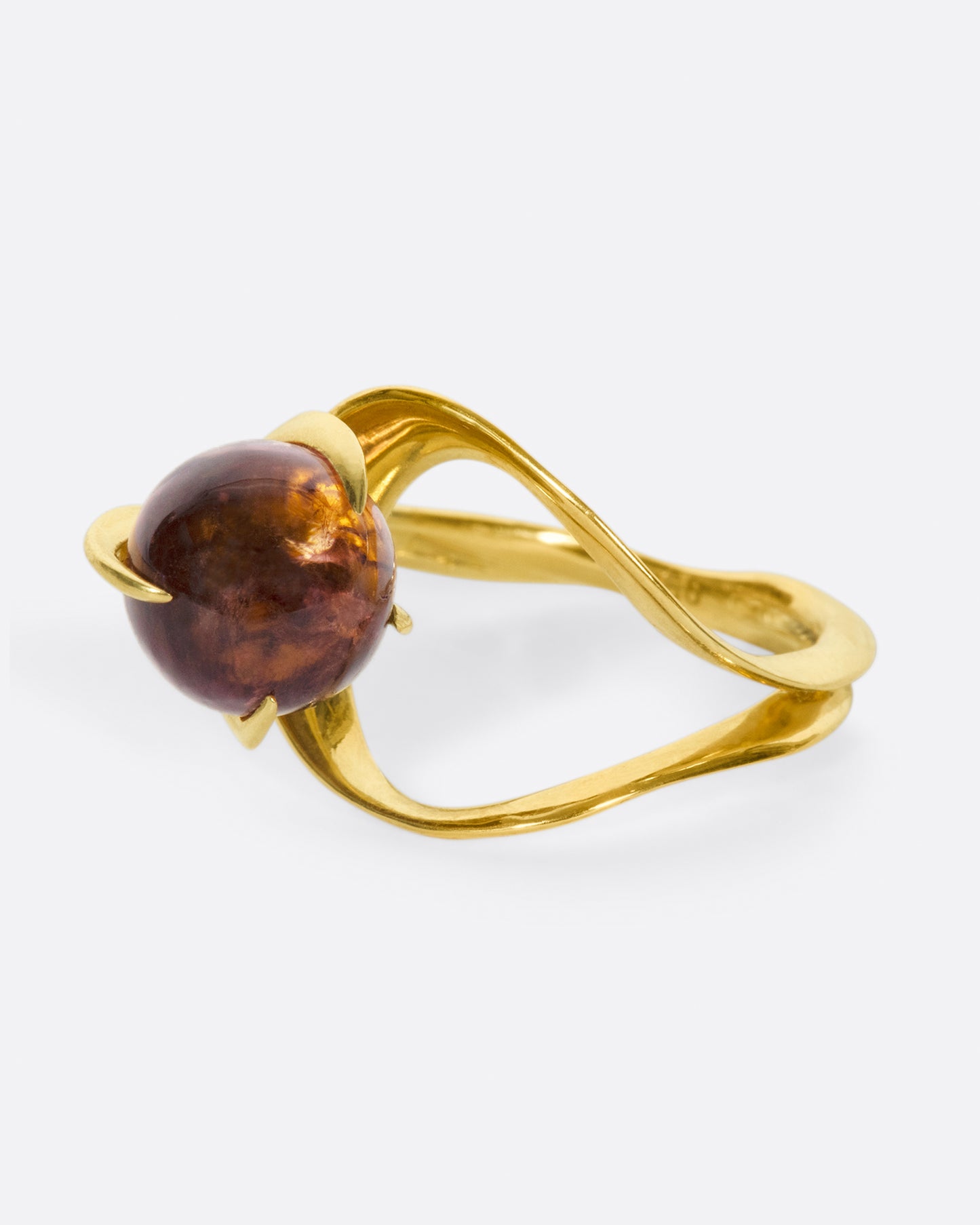 This ring is somehow substantial and airy, intricate and simple.