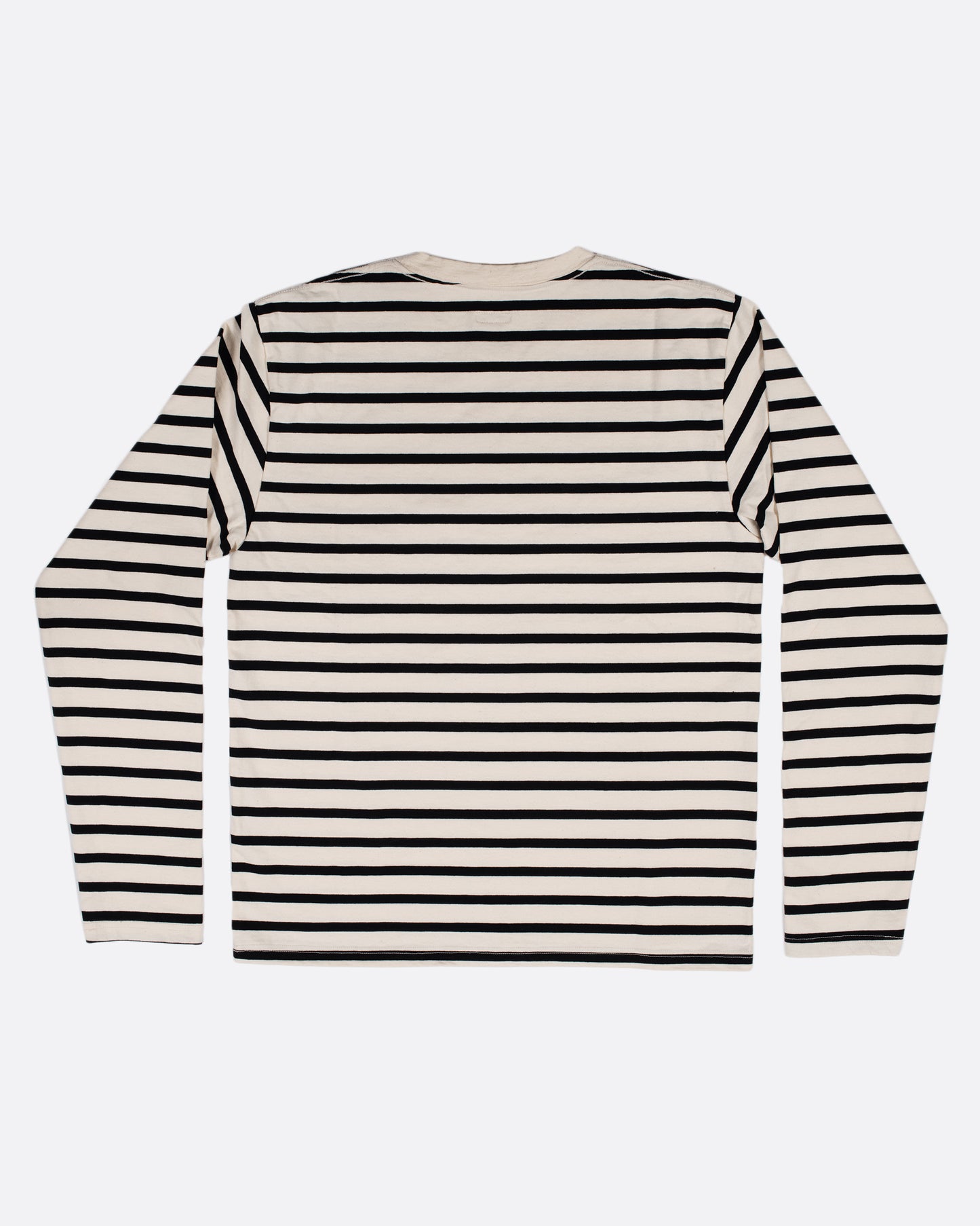 A black and white striped, cotton, crewneck shirt with Kapital's fan favorite rainbow smiley elbow patches.