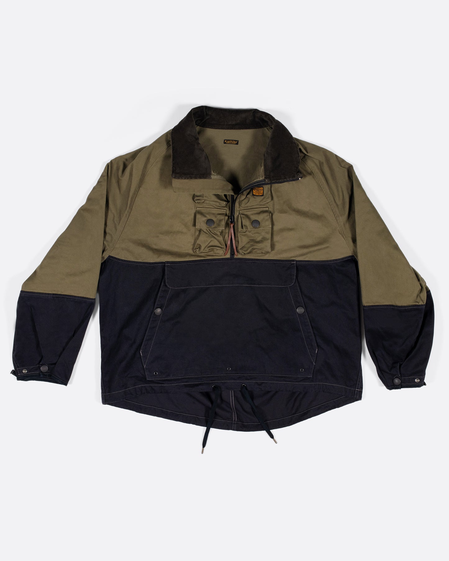 One of Kapital's beloved anoraks, made from two colors of cotton chino material with six mini pockets around the neck and a zip pocket with a flap on the front.