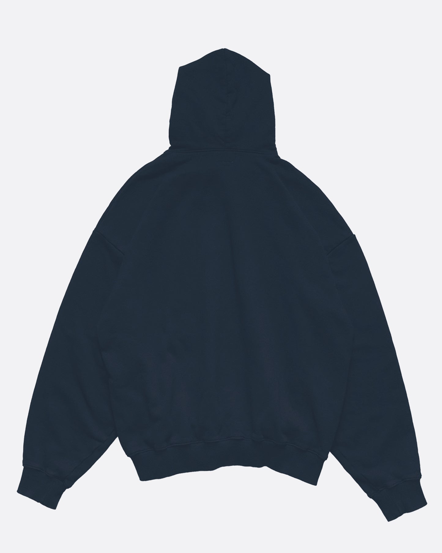 A blue cotton fleece hoodie with an oversized silhouette, accented with wide, fixed drawstrings in a geometric pattern with long red fringe.