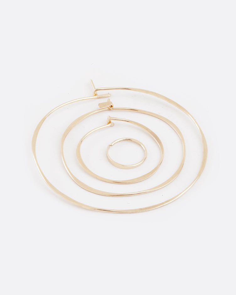 Fairmined gold, hand-hammered, large round hoop earrings that close upon themselves.