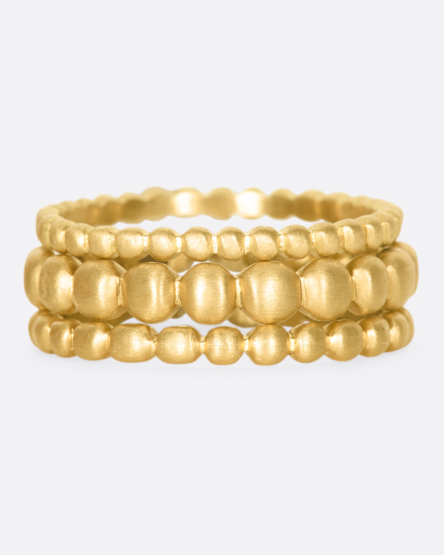 A perfect gold bubble stacking ring that adds volume and texture between your gem-heavy rings or looks great on its own. This comes in three different widths.