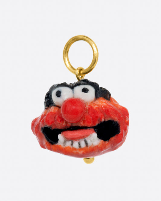 A handmade 3D porcelain Animal muppet charm with a yellow gold bail.