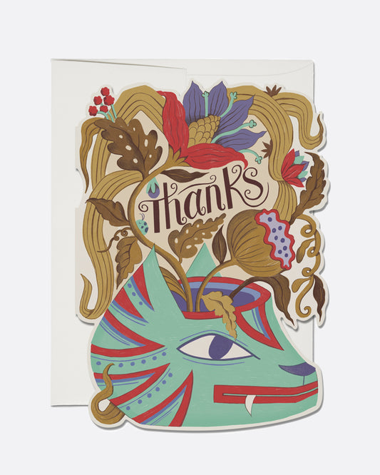 A quick note of thanks is hidden in the flowers of this vase.