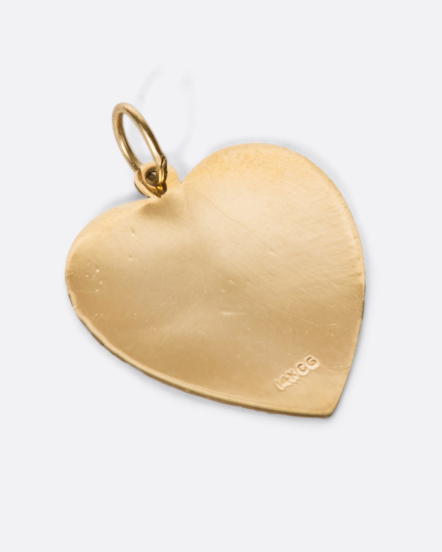 A shiny tag pendant with the perfect focal spot, ready for engraving.