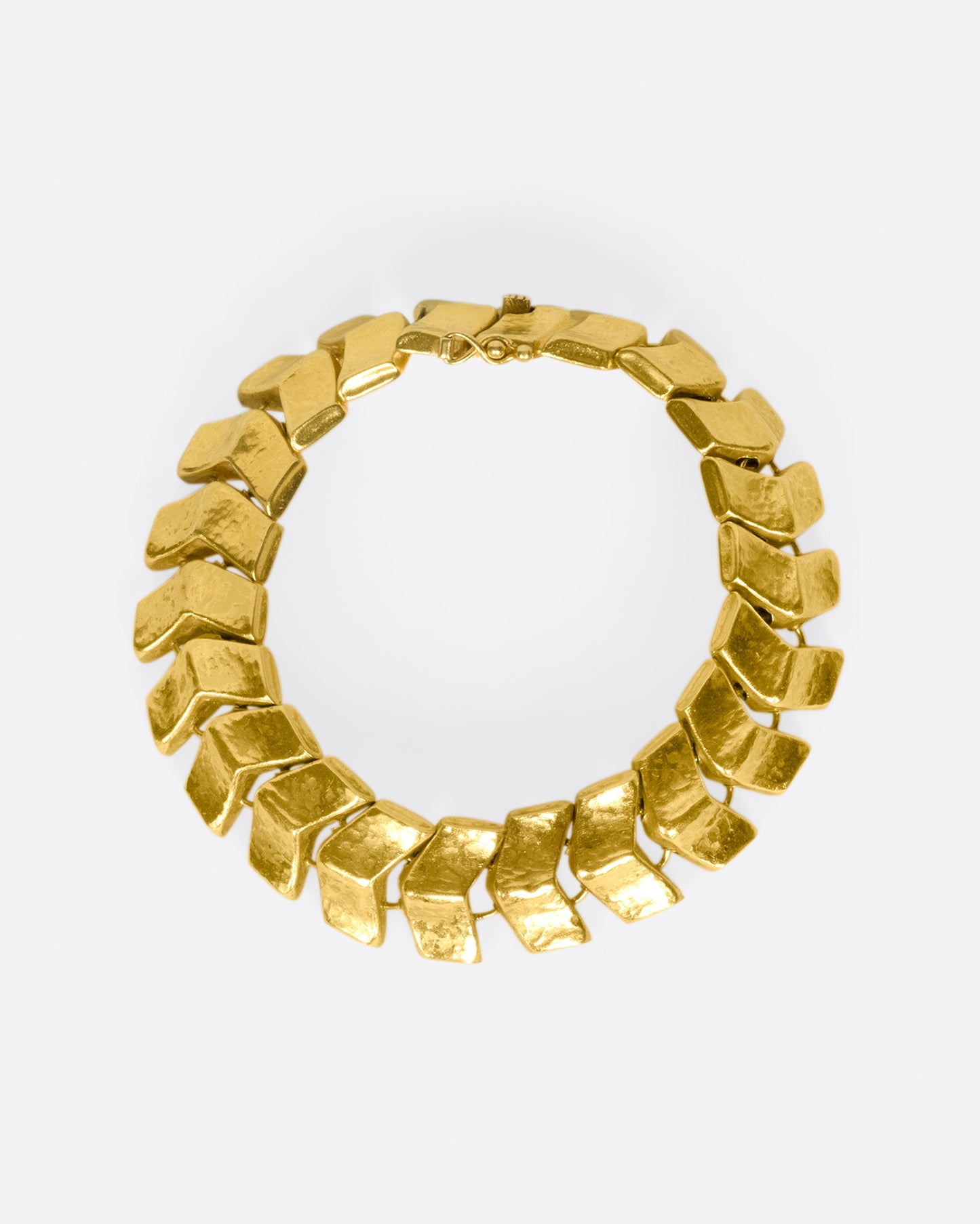Made from buttery, high karat gold, the links on this bracelet are both substantial in size and in impact.