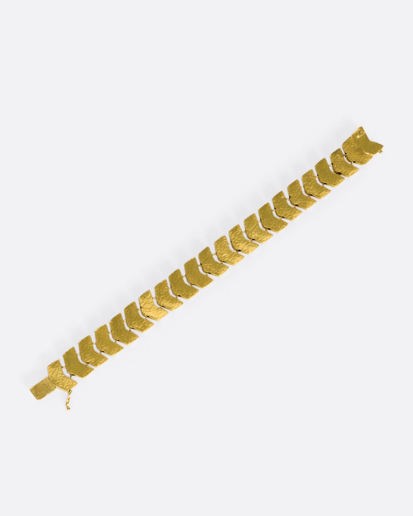 Made from buttery, high karat gold, the links on this bracelet are both substantial in size and in impact.