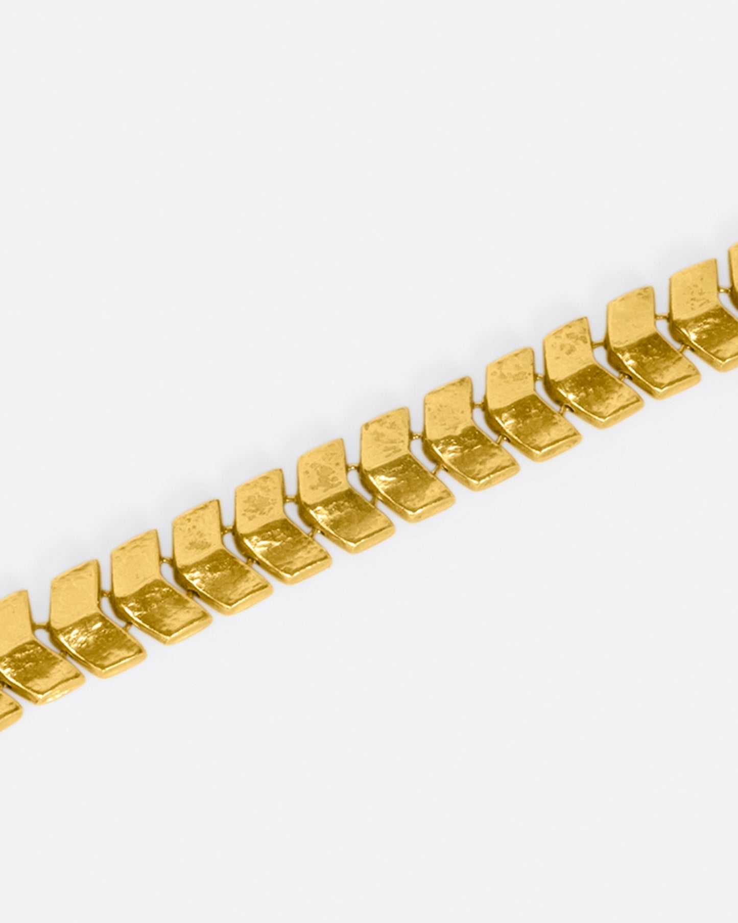 Made from buttery, high karat gold, the links on this bracelet are both substantial in size and in impact.
