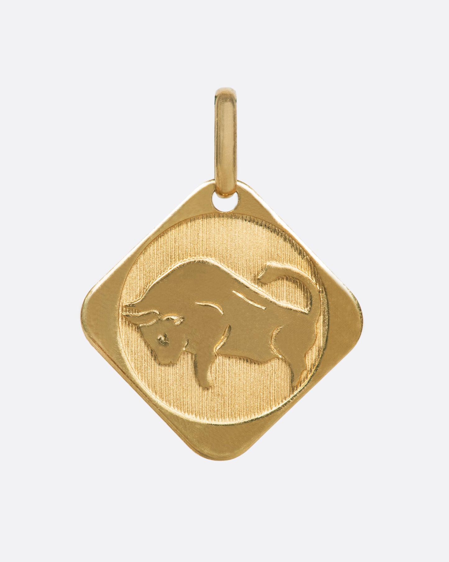 A square, polished pendant, hung by one of its corners.