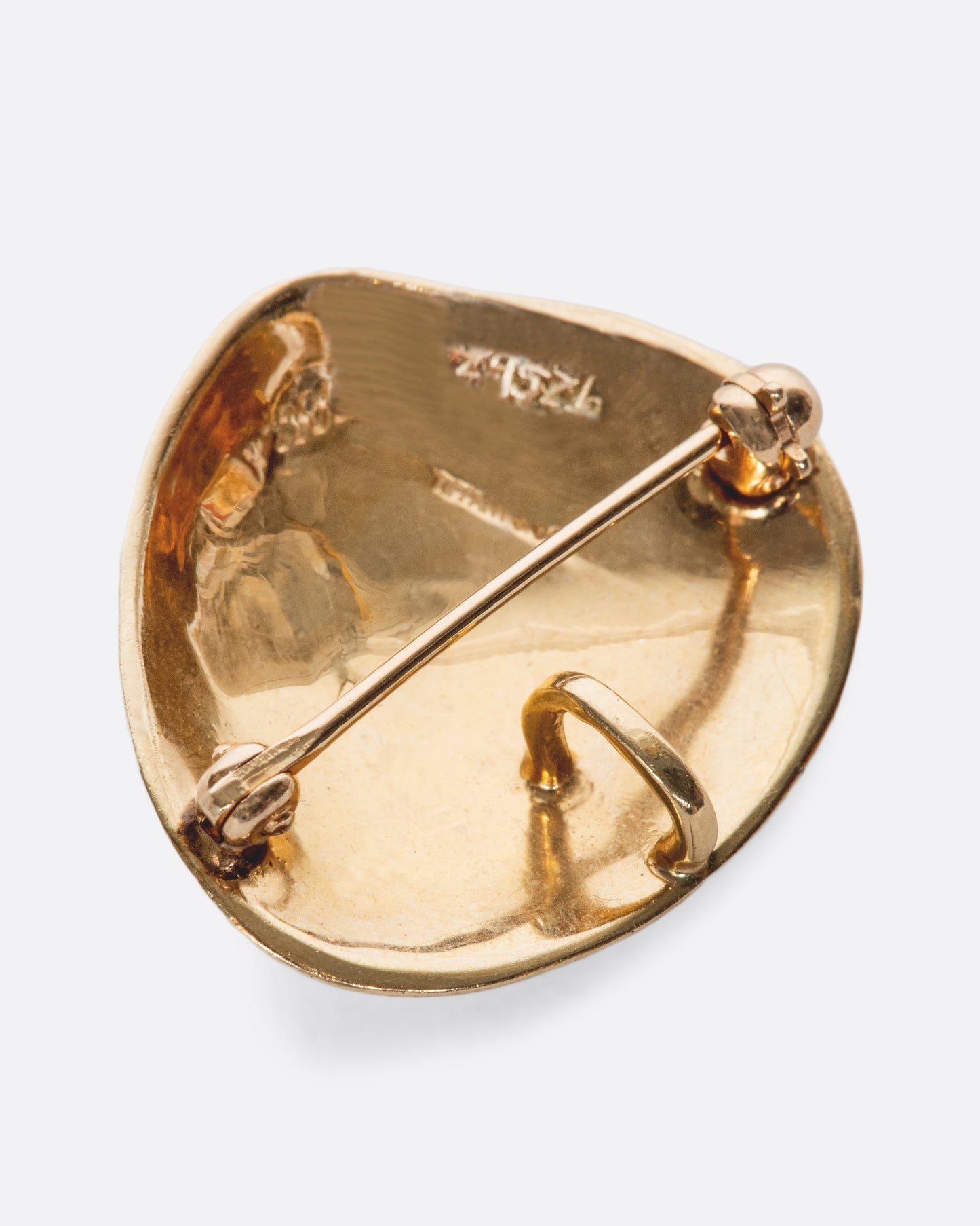 You can wear this vintage Tiffany & Co. piece as a pin or a pendant.