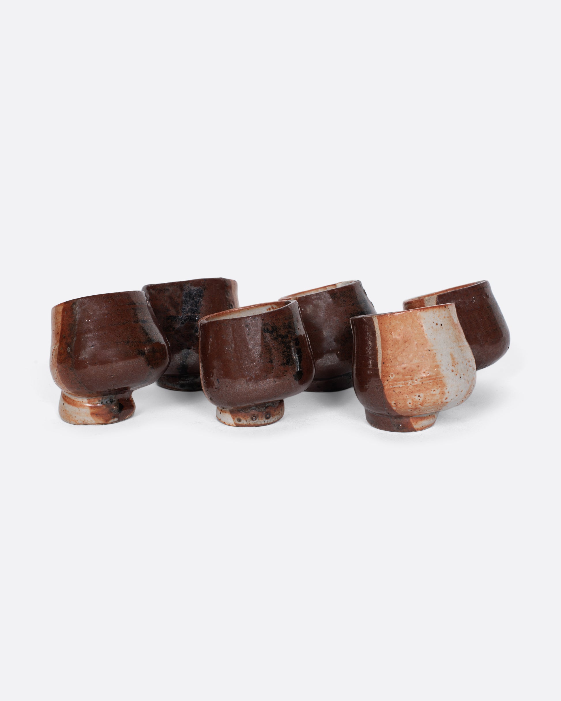 A handmade set of six cups that's perfect for serving your favorite mezcal.