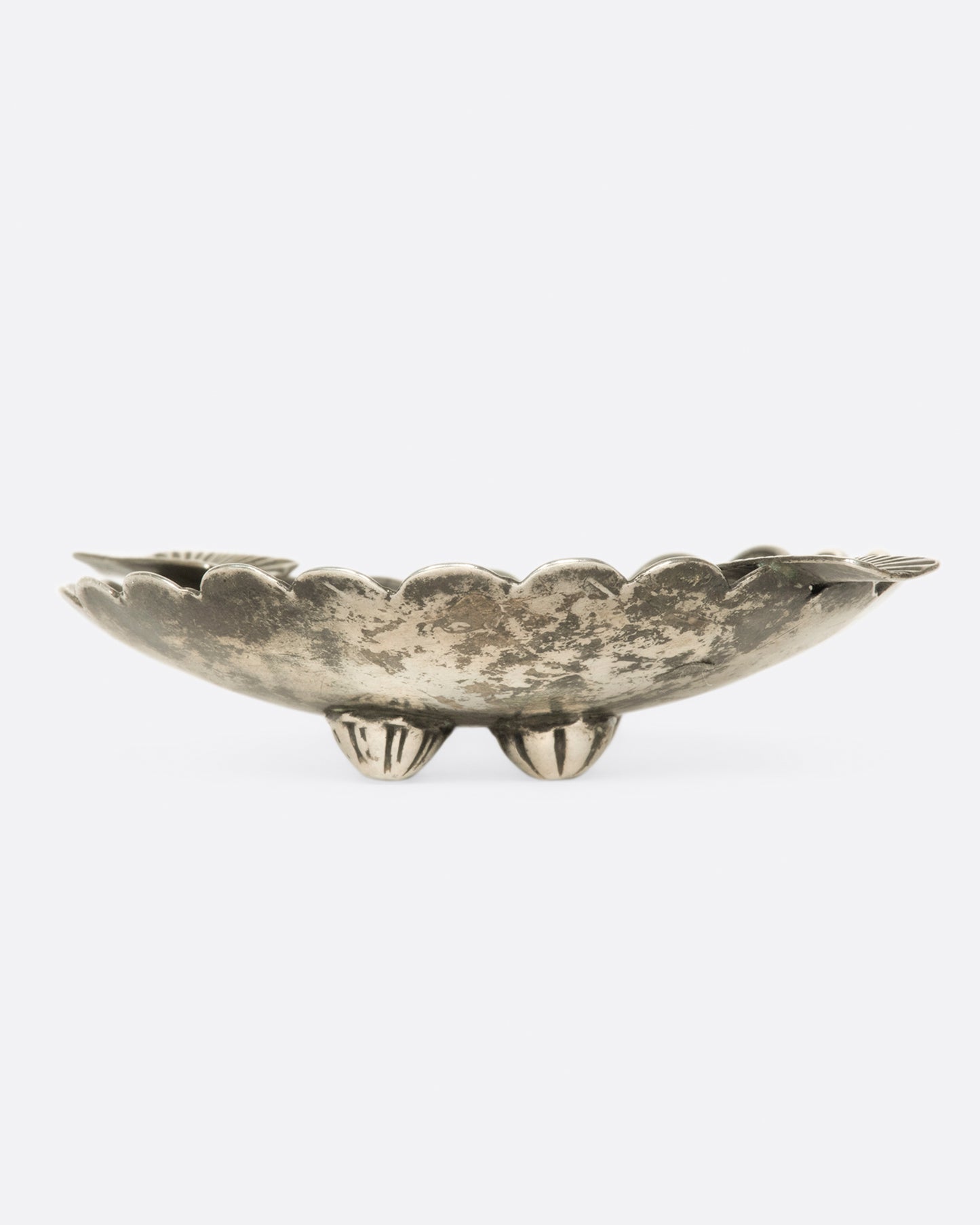 The great patina and stamped details on this vintage Native American ashtray are what bring it to life.