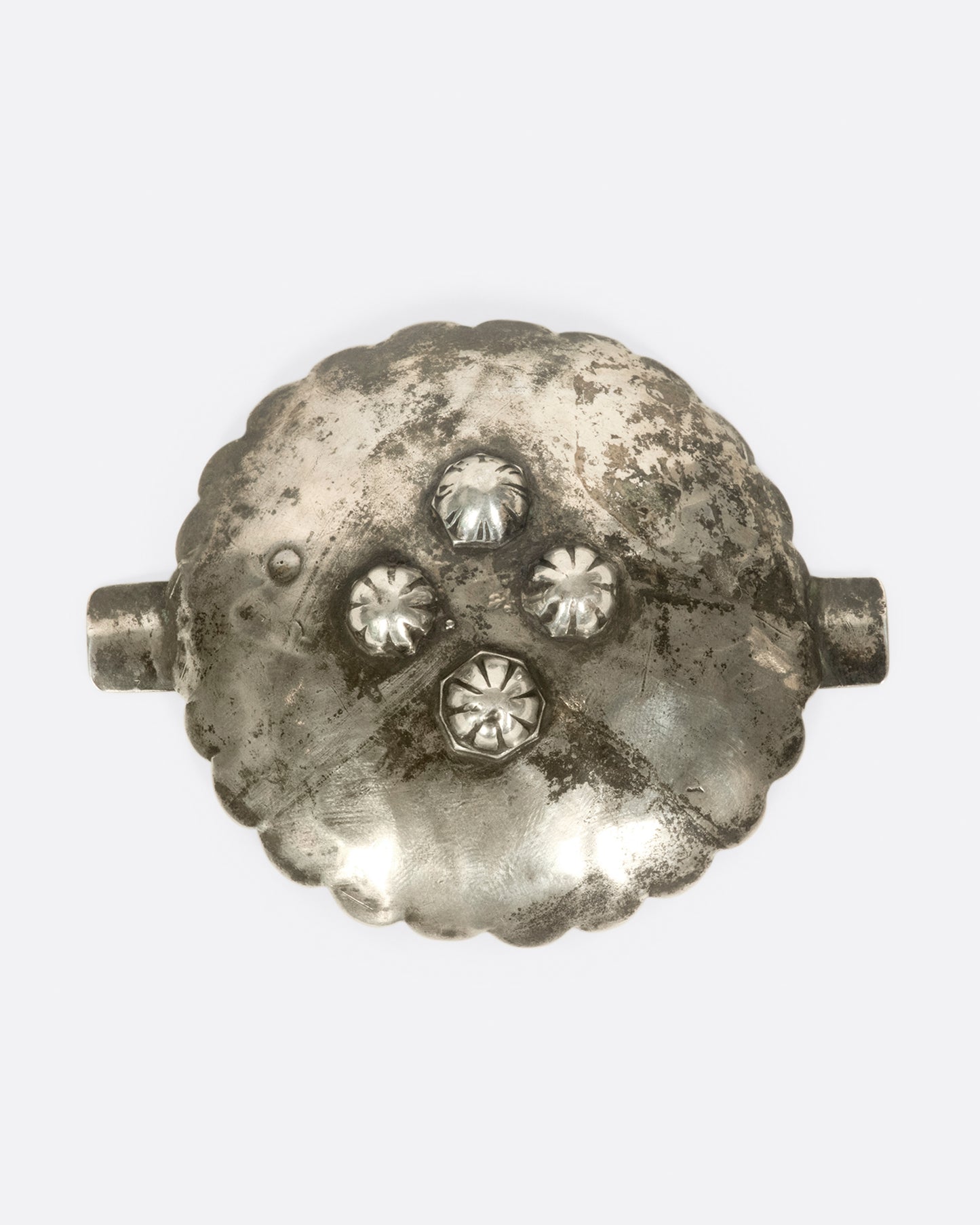 The great patina and stamped details on this vintage Native American ashtray are what bring it to life.