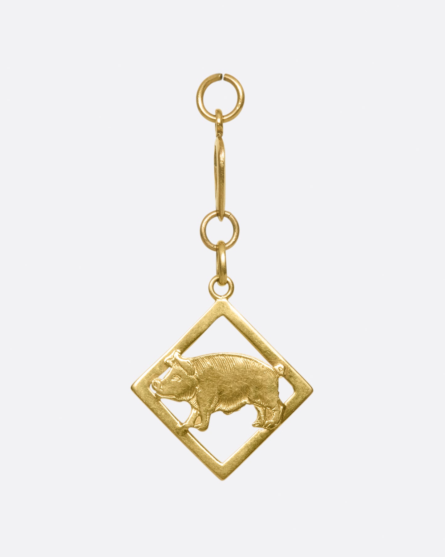 A friendly farmyard creature that dangles four links below your chain making it easy to layer with your other favorite charms.