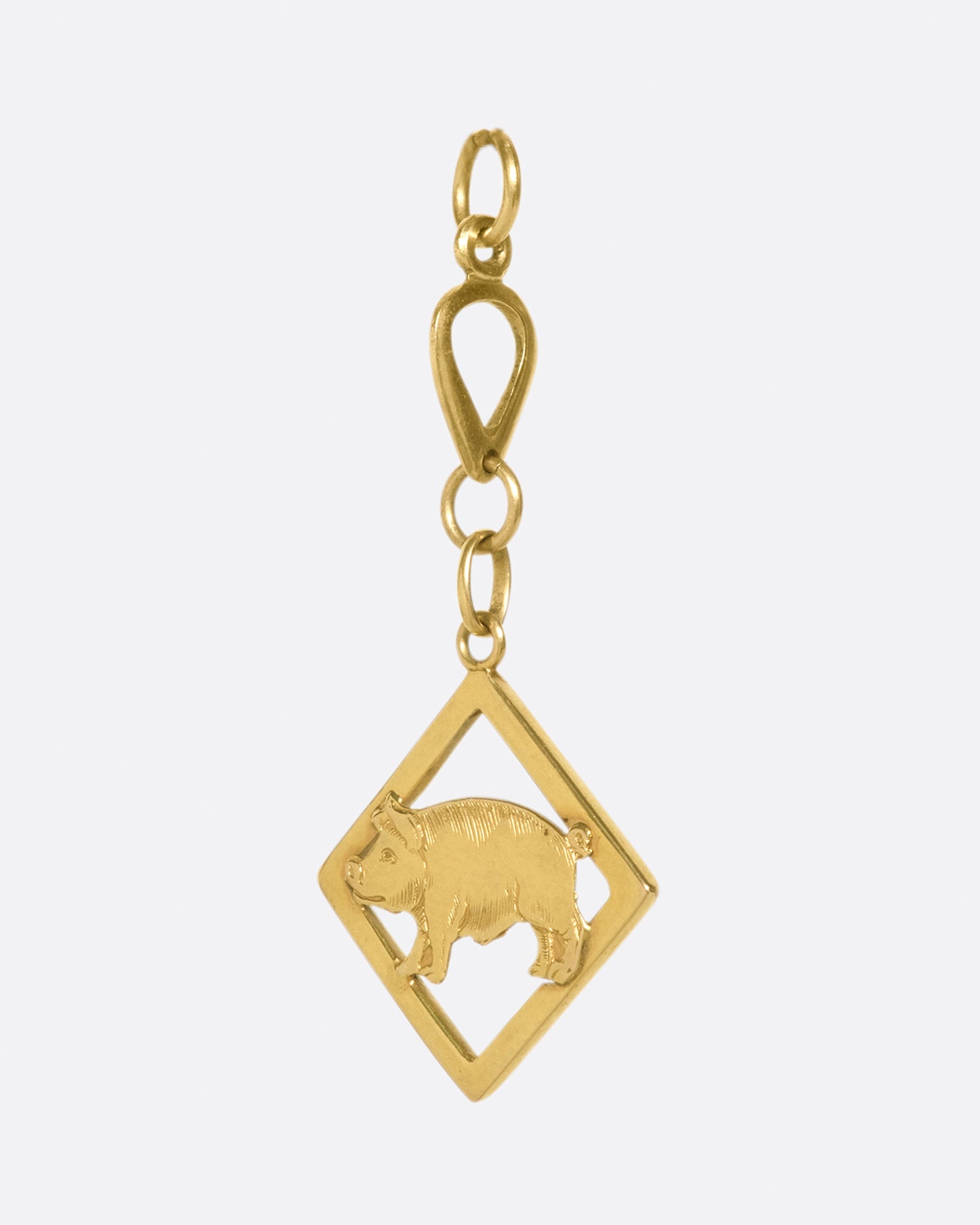 A friendly farmyard creature that dangles four links below your chain making it easy to layer with your other favorite charms.