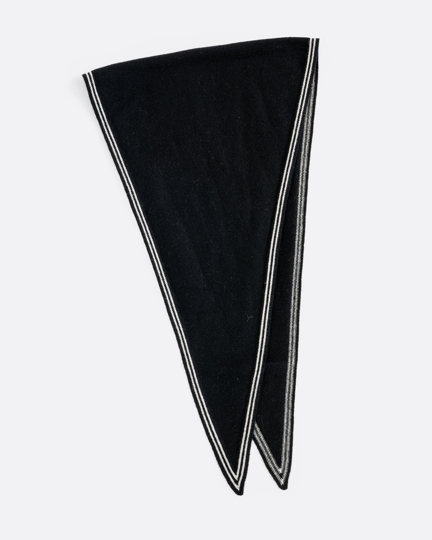 A cashmere black neck scarf with stripy white edges, shown folded.