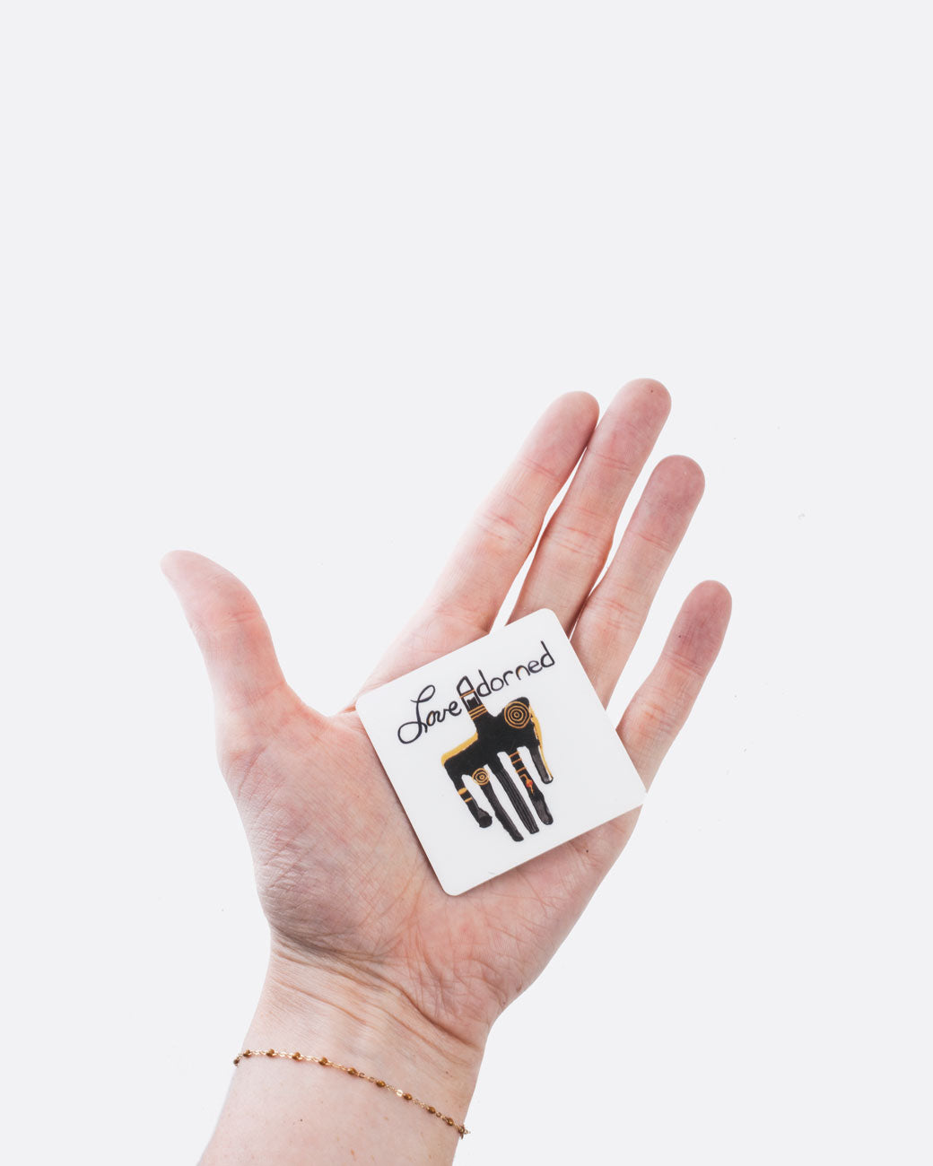 physical gift card with custom love adorned art and logo shown in hand 2" square to fill palm