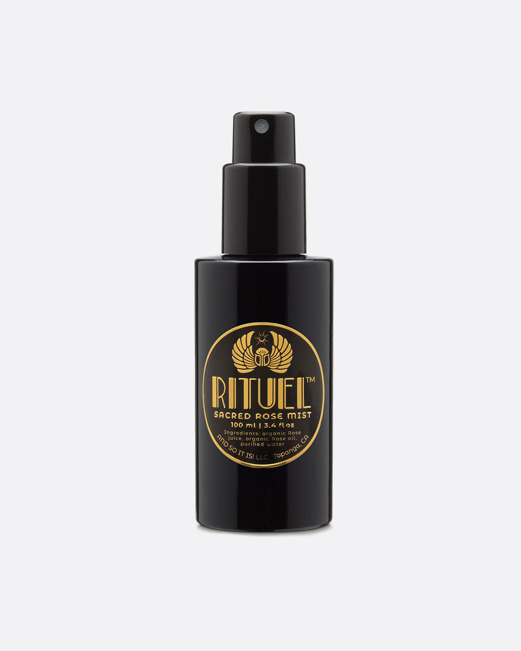 A black spray bottle of Rituel face mist. Shown from the front.
