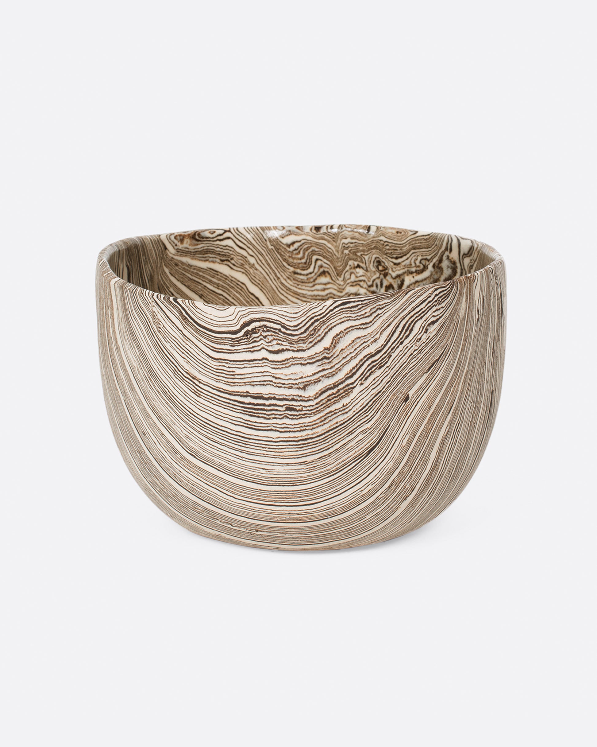 Medium brown and white stoneware nerikomi bowl. Shown from the front.