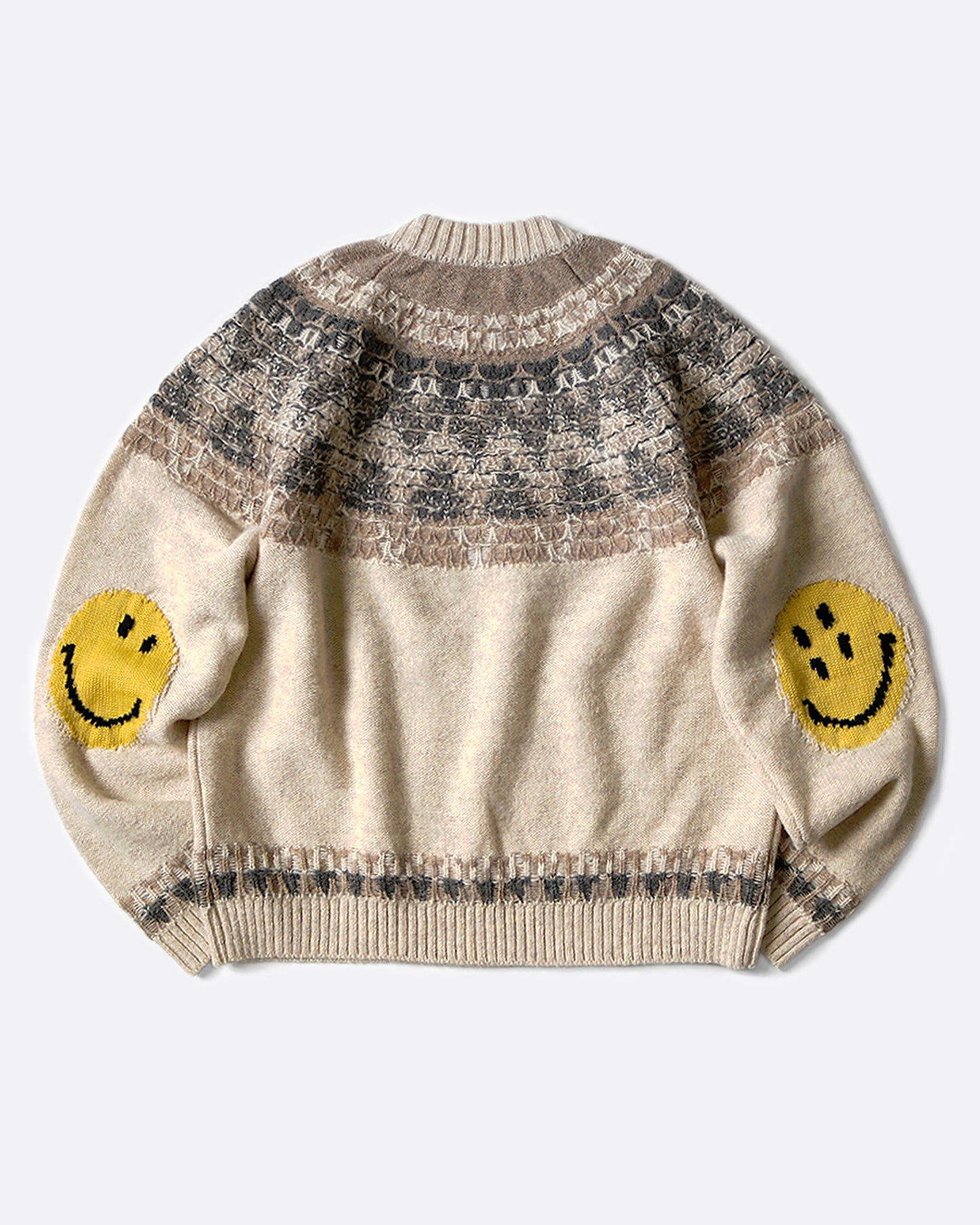 A crewneck pullover sweater with a Nordic pattern around the shoulders and smiley faces on the elbows, shown lying flat from the back.