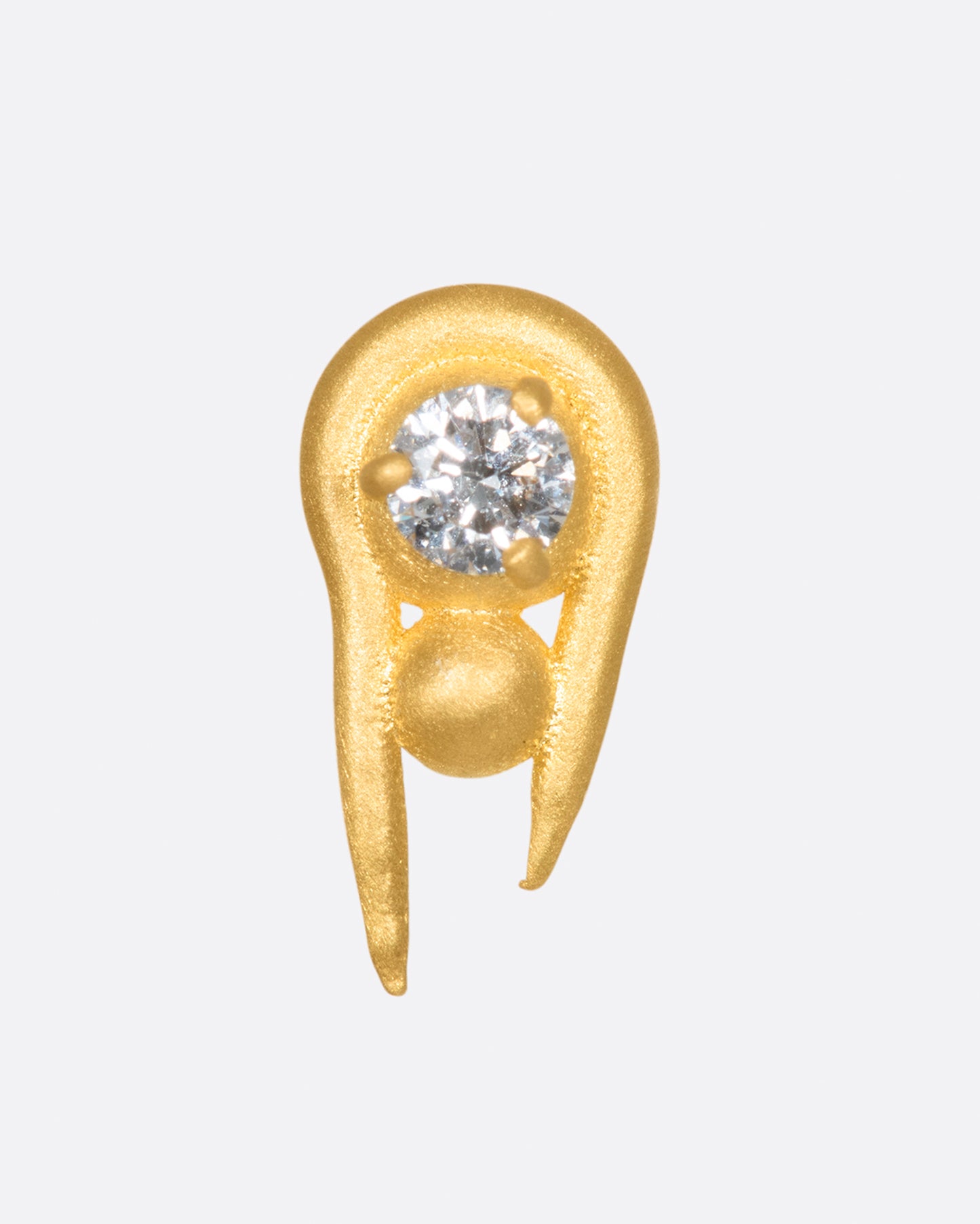 A curved high karat gold earring with a stacked sphere and brilliant cut diamond. Shown from the front.