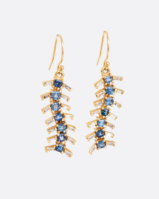 14k yellow gold centipede earrings with blue sapphire and diamond baguettes, shown from the front.