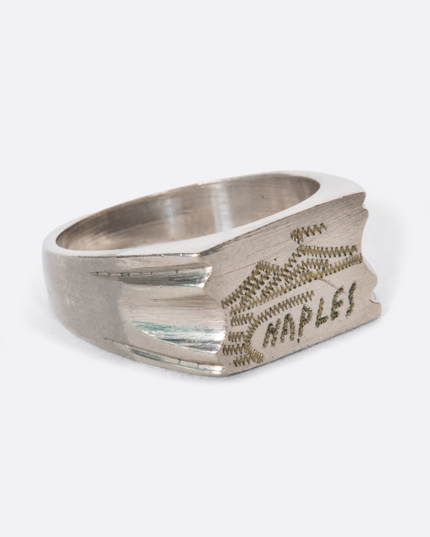 This vintage WWII-era white metal ring is a trench art treasure, depicting a smoking Mount Vesiuvious watching over the Gulf of Naples.