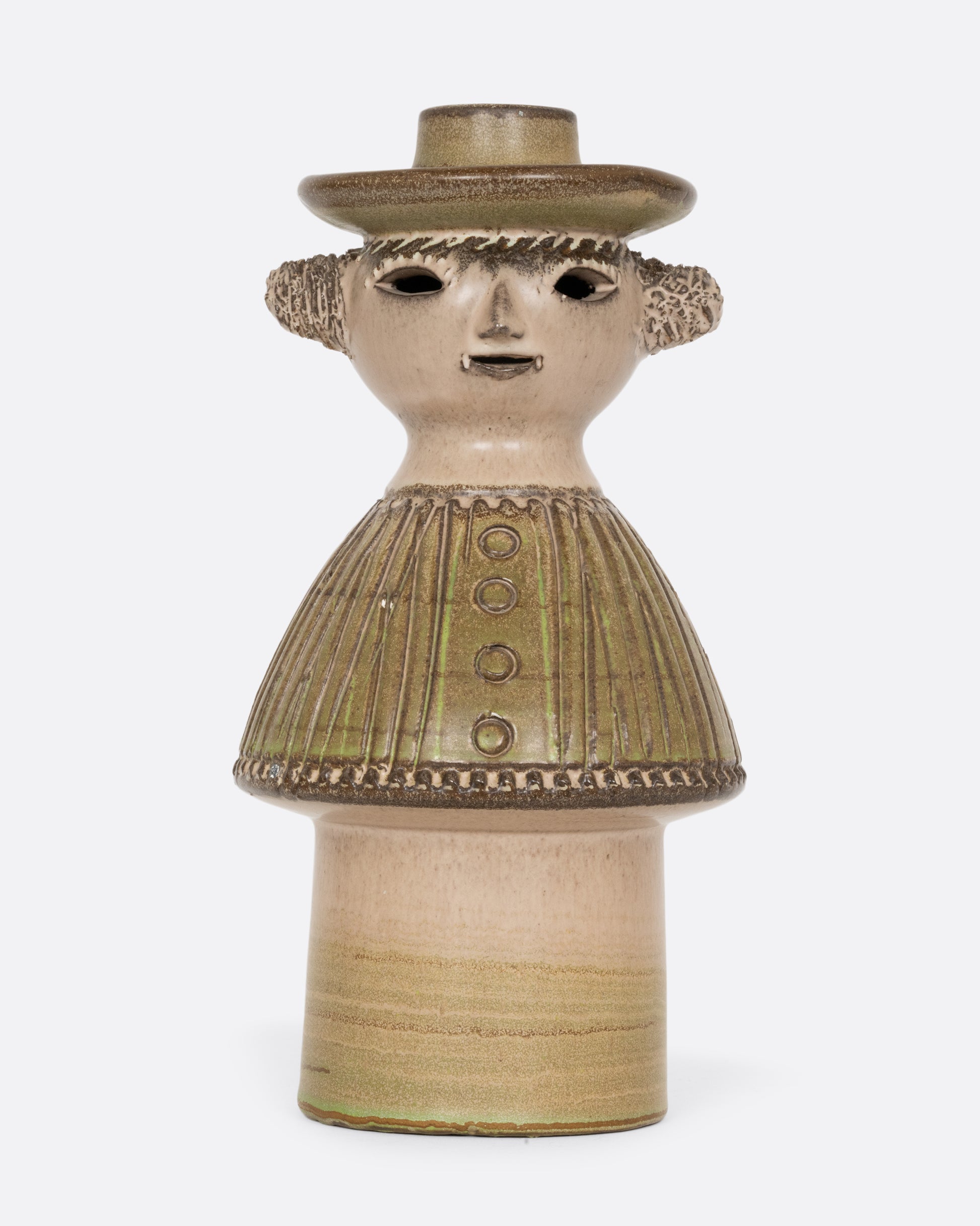 A ceramic person with a candlestick holder hat wearing a textured green outfit. Shown from the front.