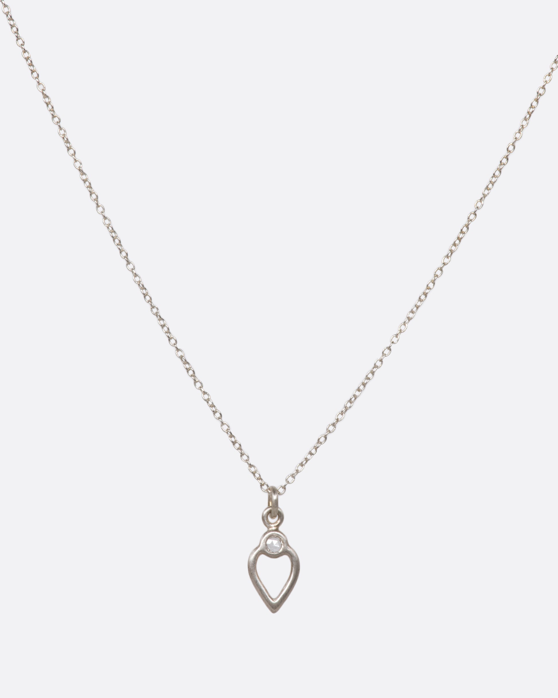 A delicate heart pendant necklace with a rose-cut diamond detail. The perfect piece if you're looking for something simple and unique to wear daily.