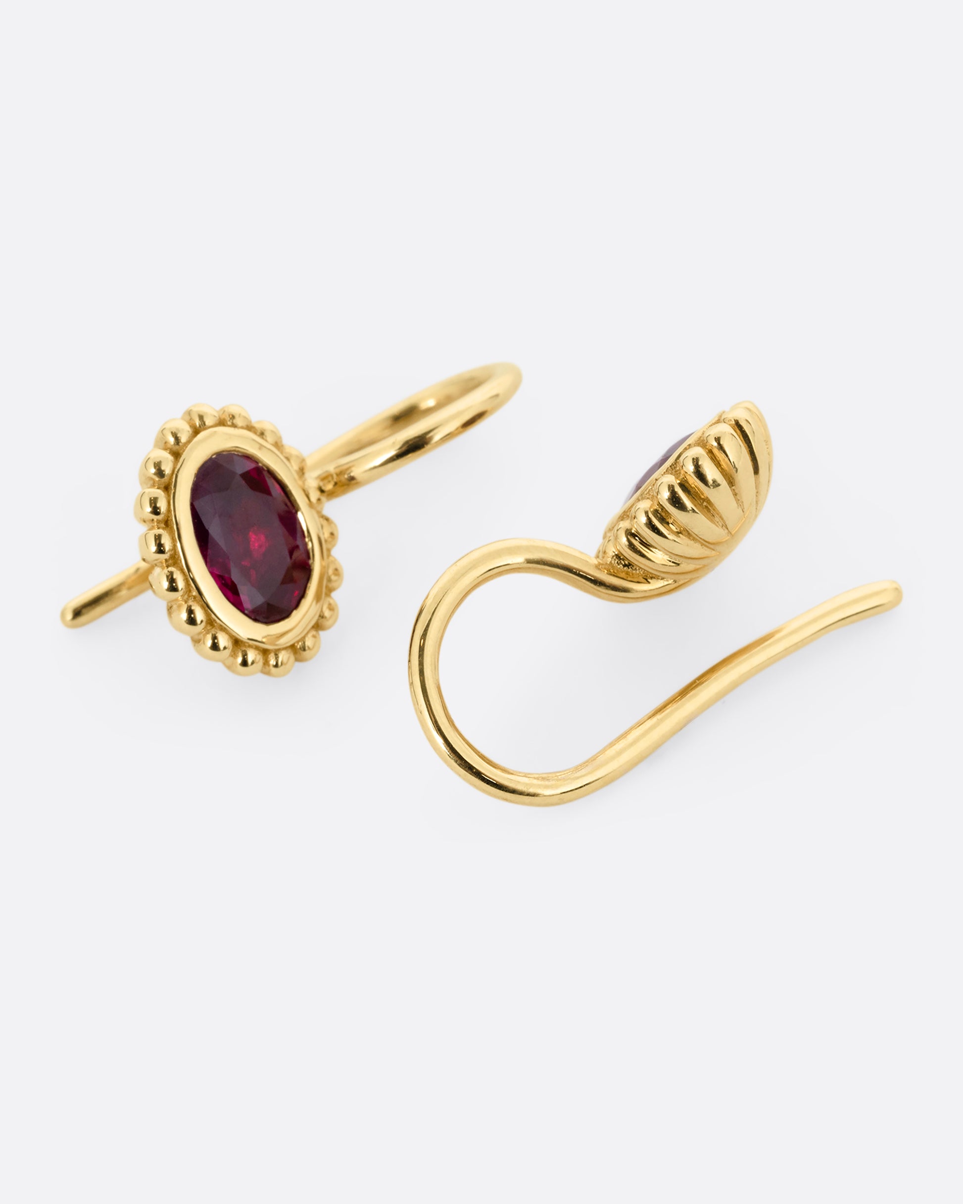 yellow gold ruby earrings shown from the back