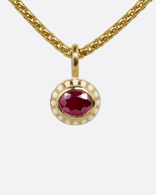 yellow gold ruby pendant with enamel shown from the front