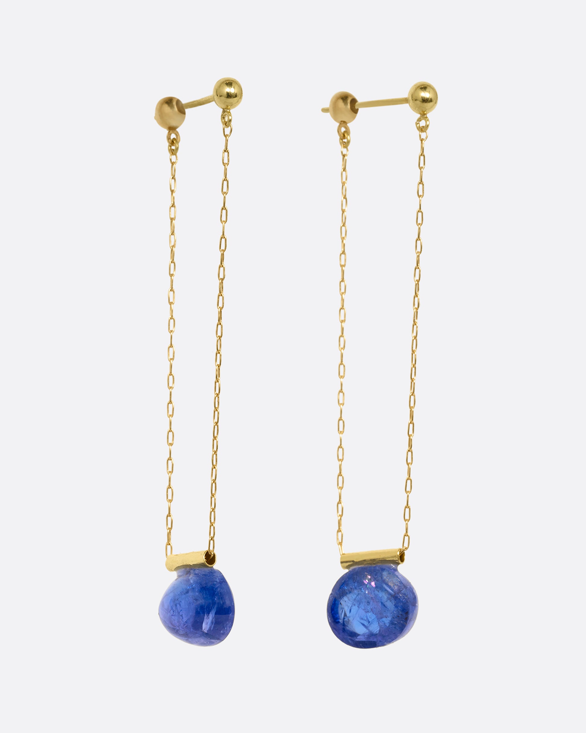 yellow gold chain earrings with tanzanite shown from the side