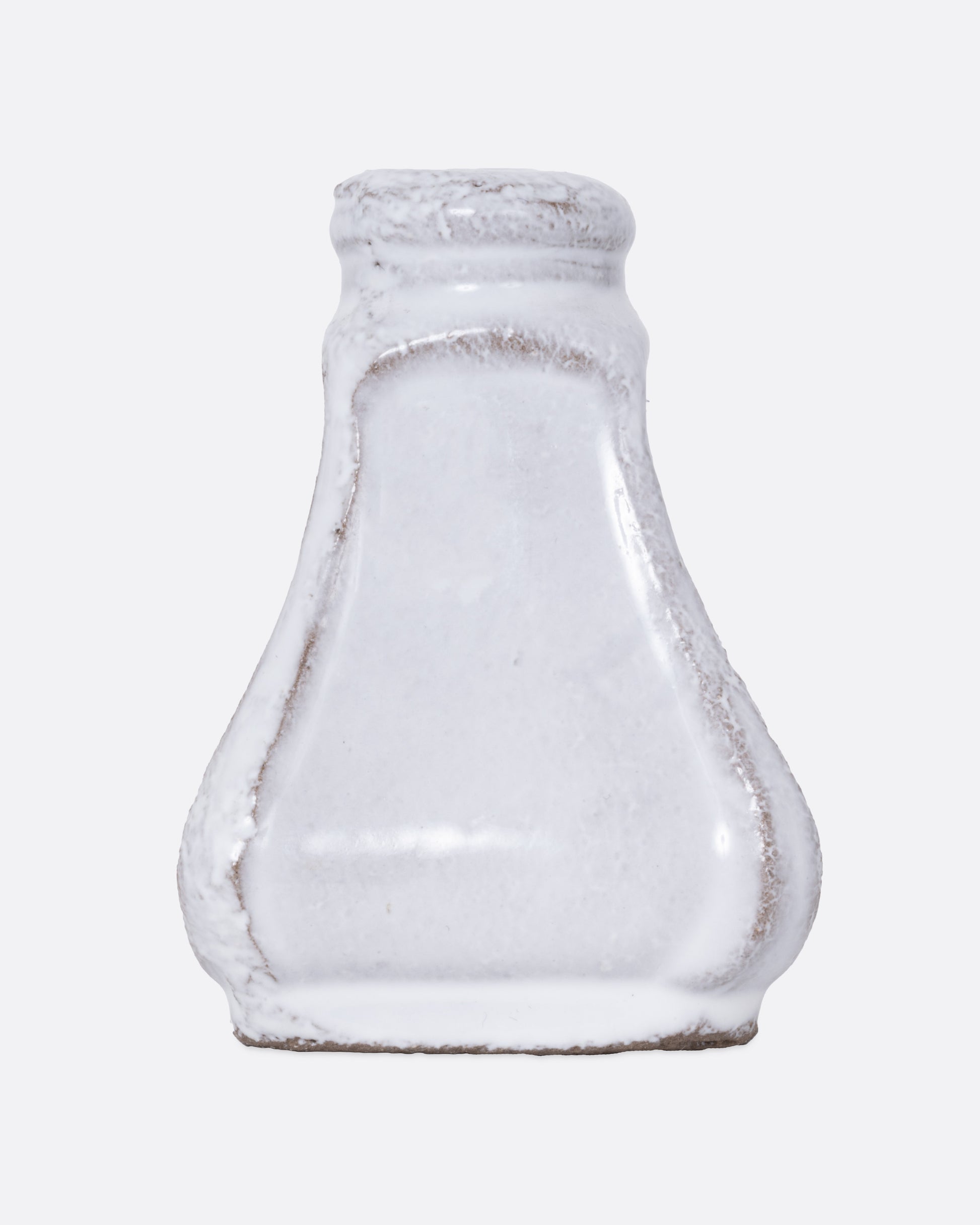 A white ceramic salt and pepper shaped incense burner, shown from the front.